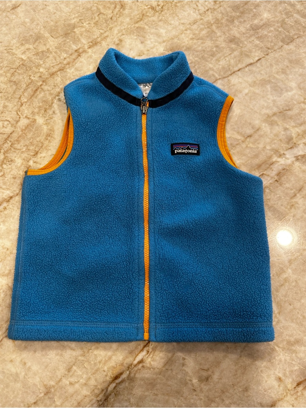 Patagonia Bright Blue Kids Fleece Jacket with Yellow Zipper